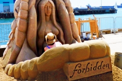 WM-2013-Sculptor in jaws of her sculpture-Forbidden-SueMcGrew